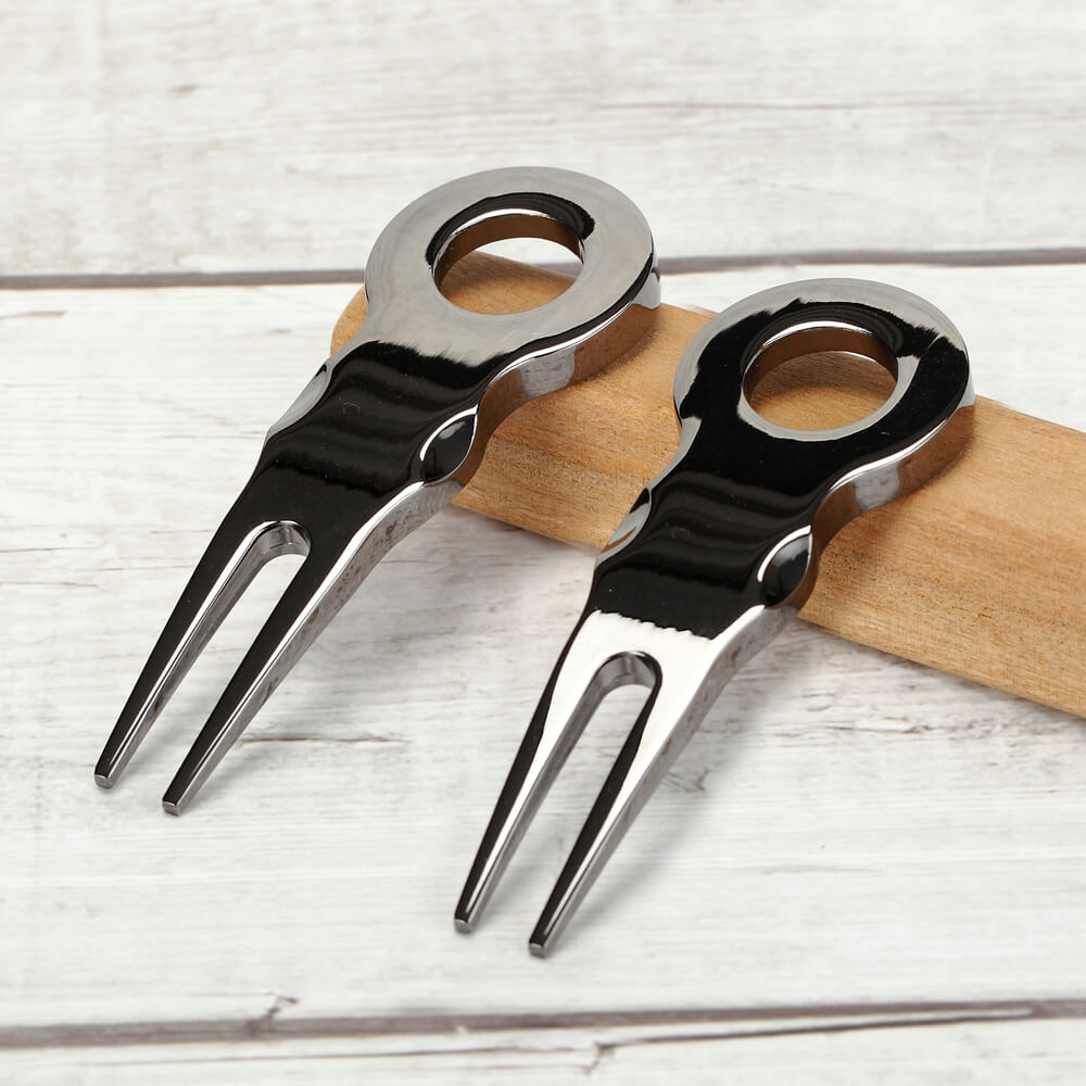 unique divot repair tool